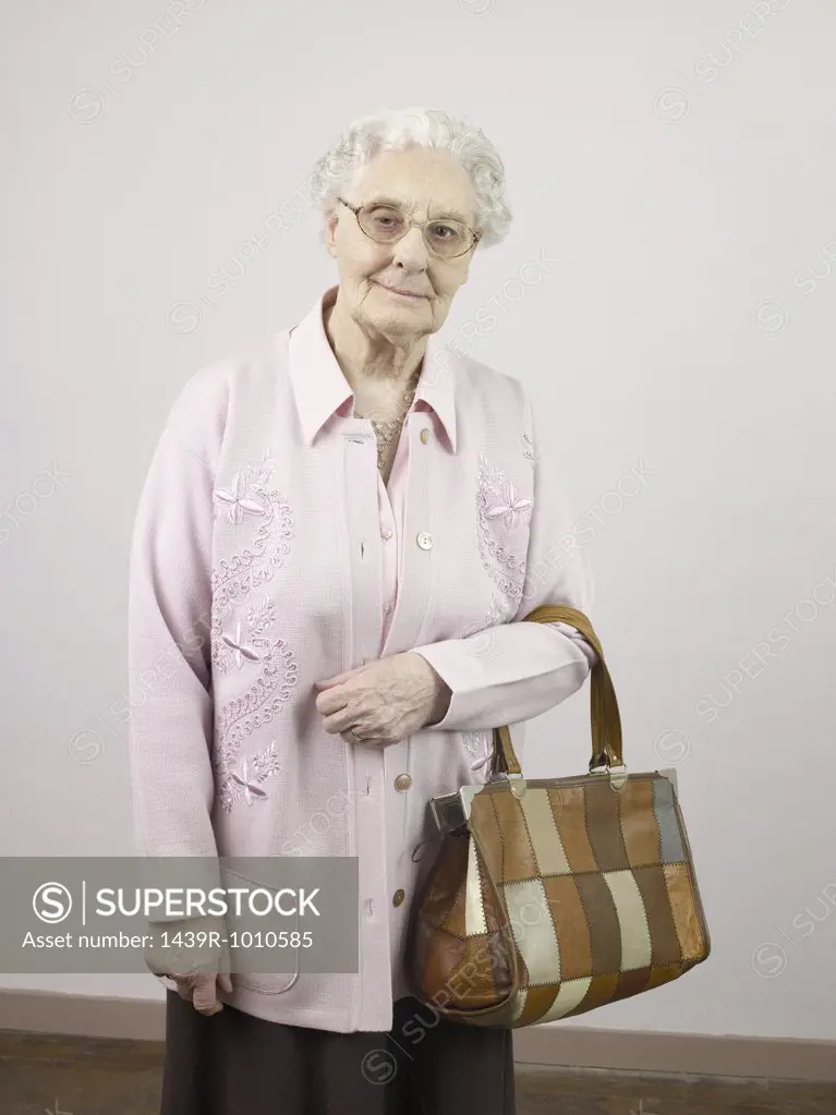 Senior woman with a handbag