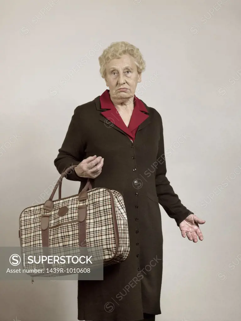 Senior woman carrying bag