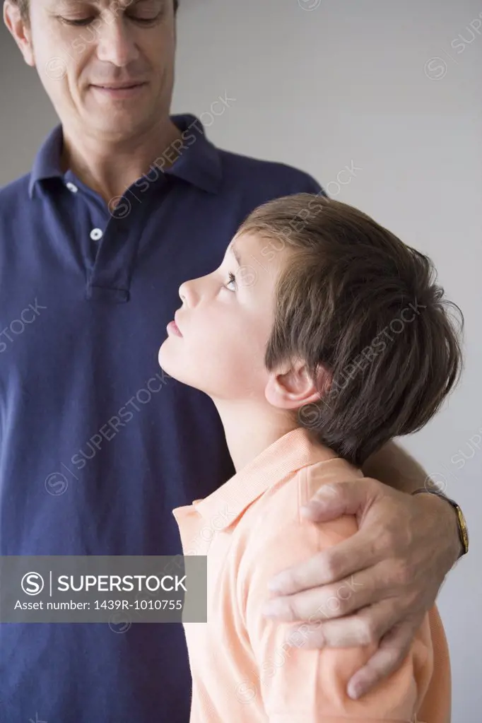 Son looking up to father