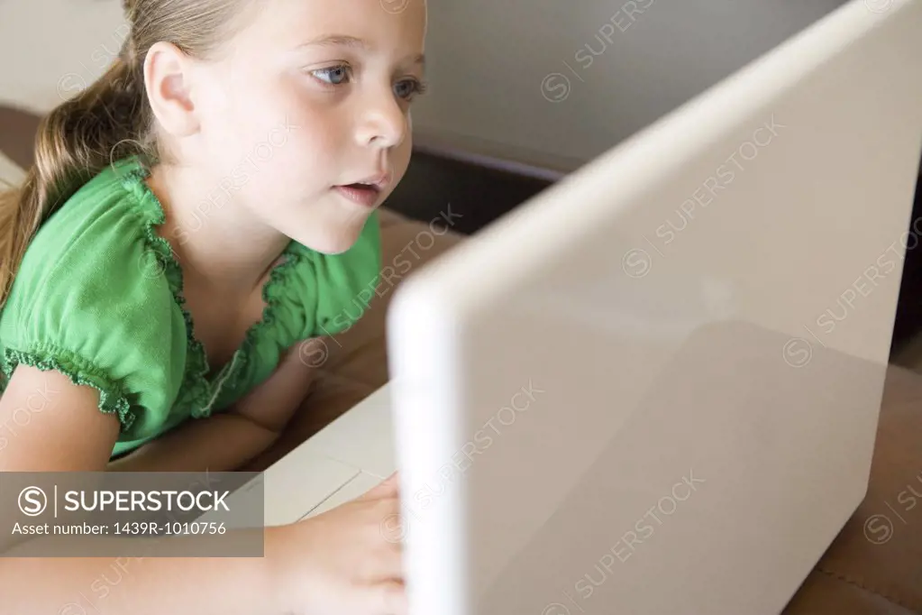 Girl using laptop computer