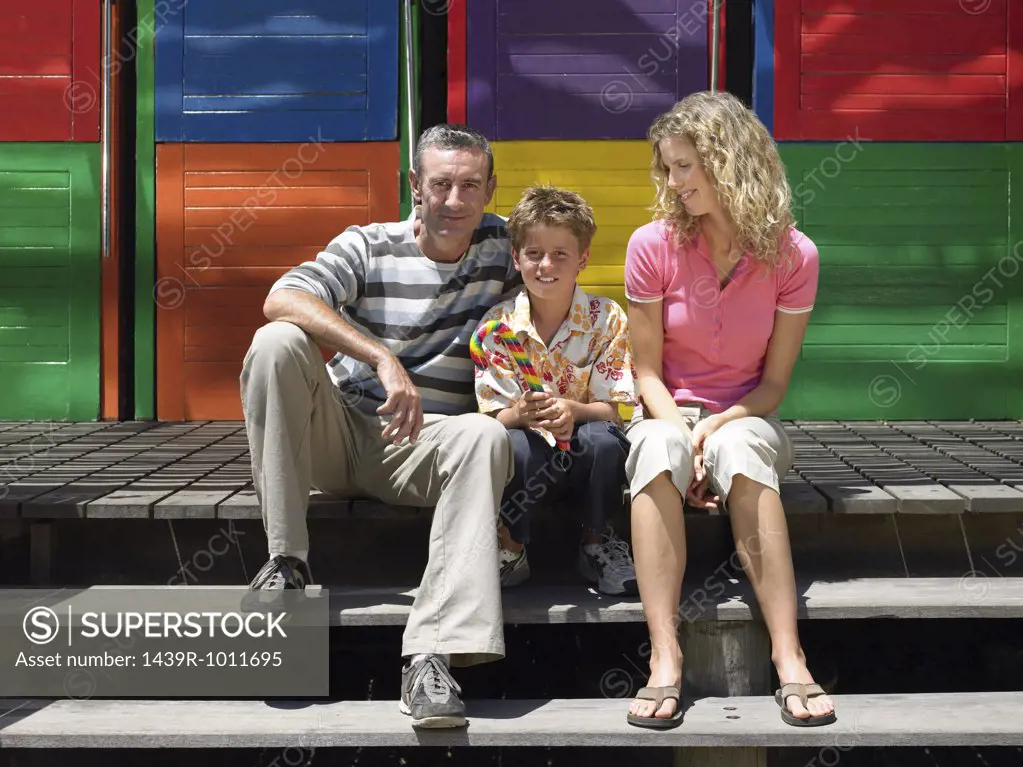 Family sitting on steps