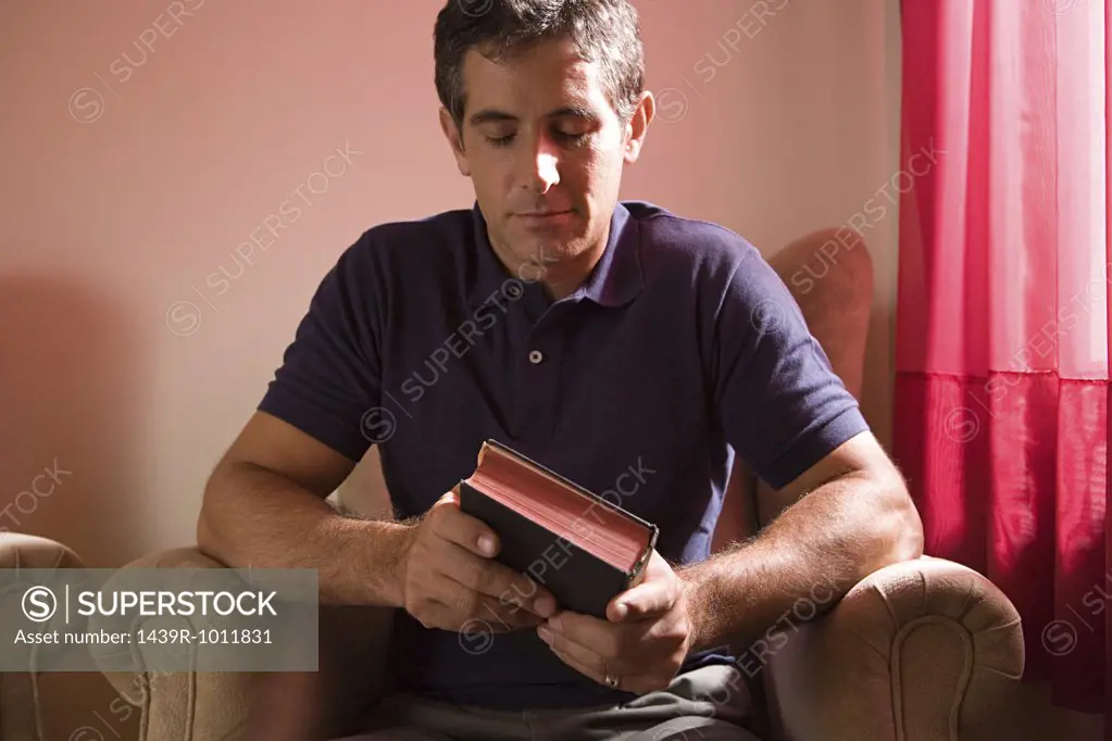 Man holding the bible