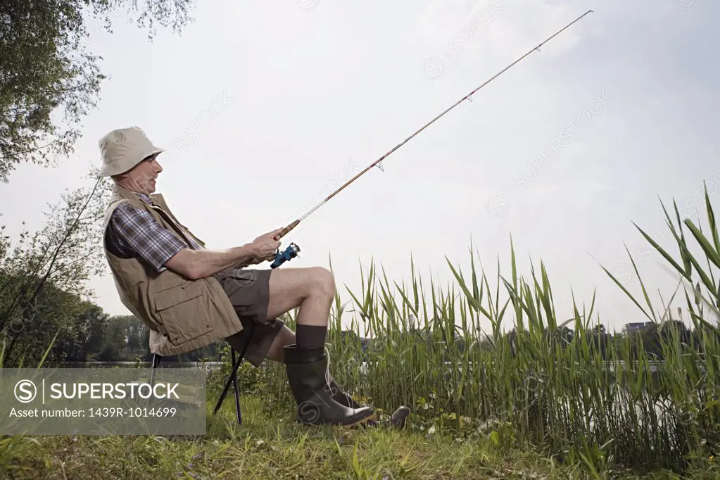 Senior man fishing