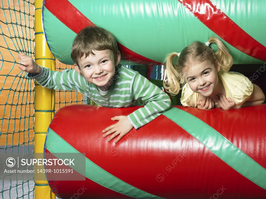 Boy and girl in soft play area