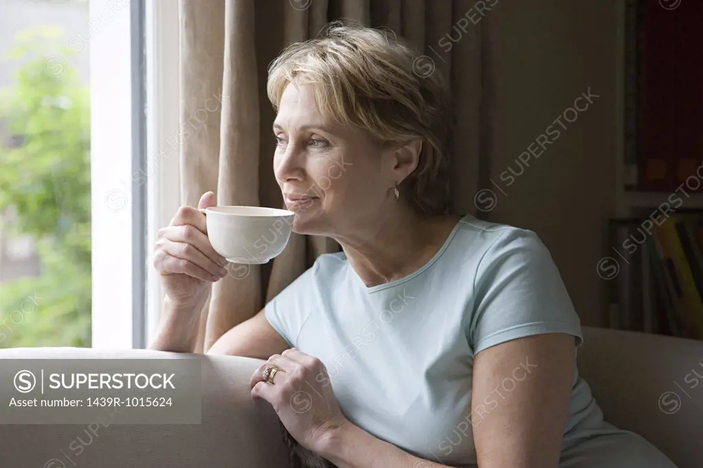 Woman relaxing with a cup of tea