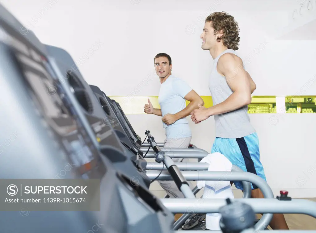 Two men on treadmill in health farm