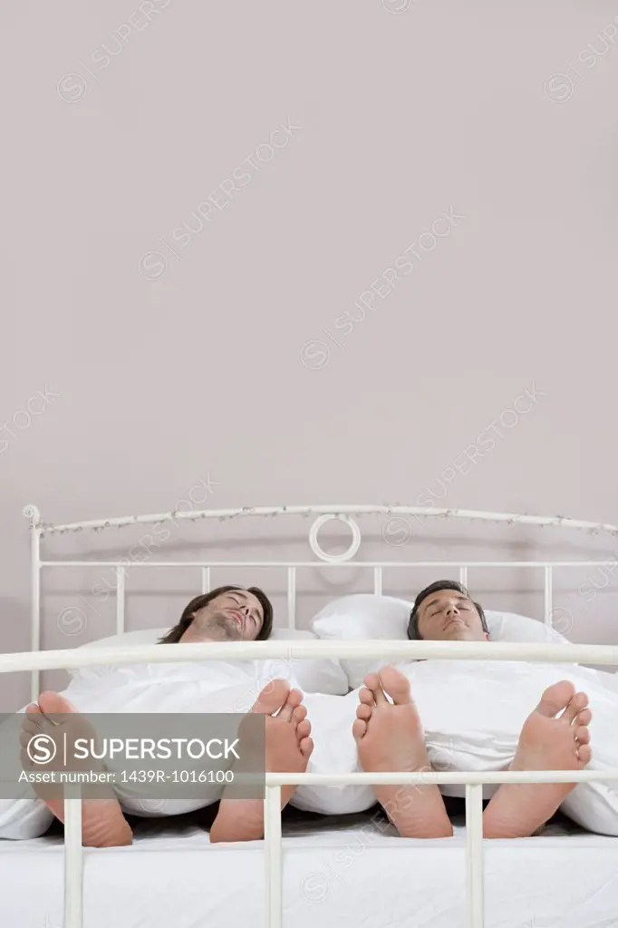 Gay couple asleep