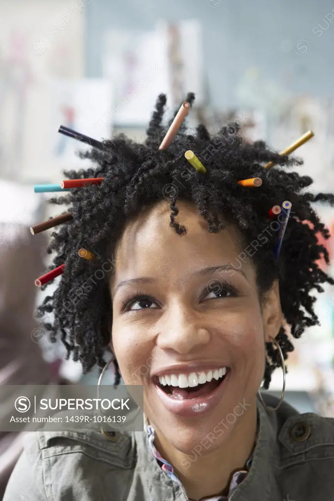 Woman with pencils in her hair