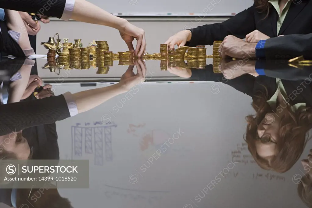 Businesspeople counting money