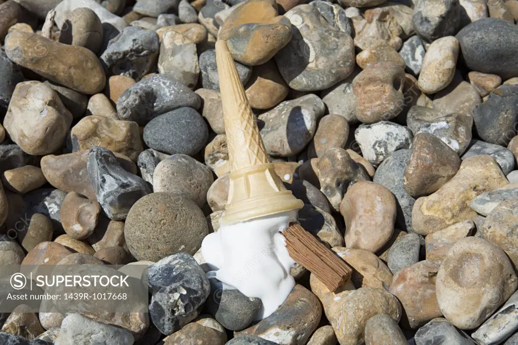 Ice cream dropped on a beach