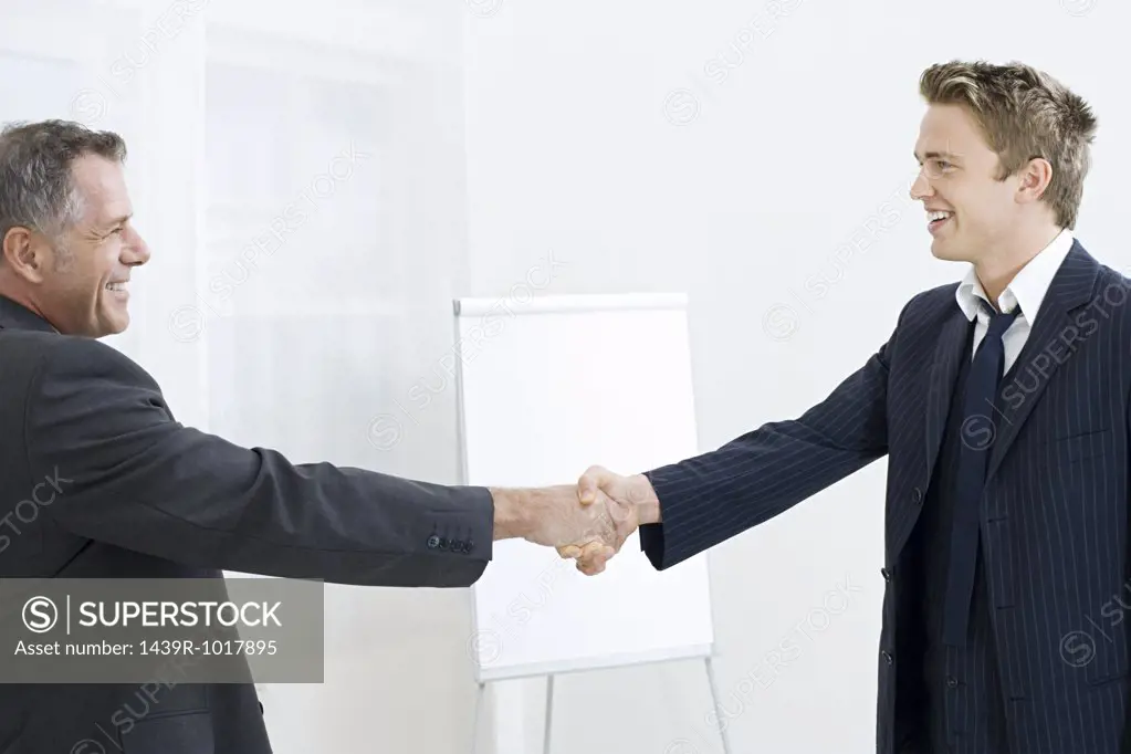 Businessmen asking hands