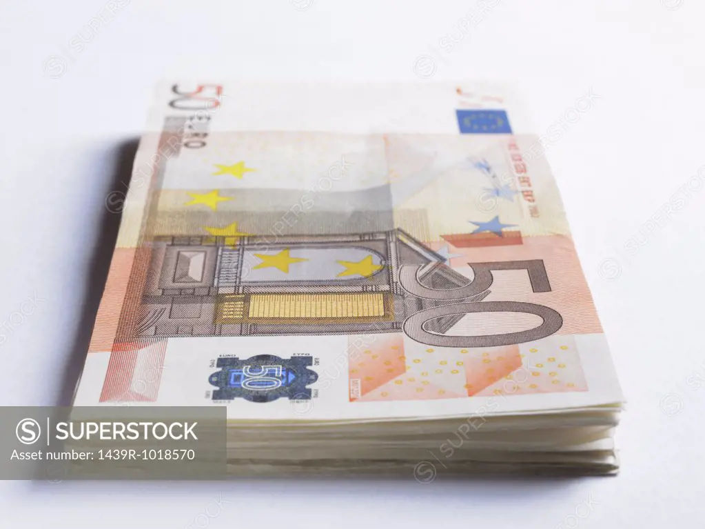 Pile of fifty euro notes