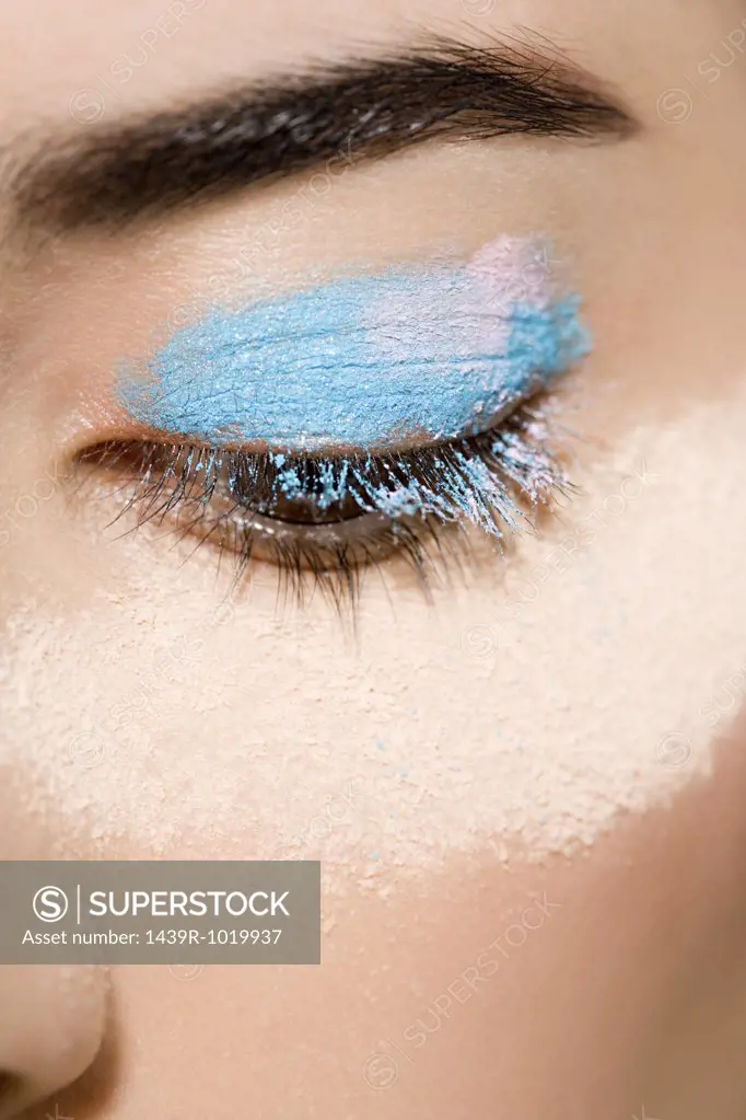 Woman with powder around her eye