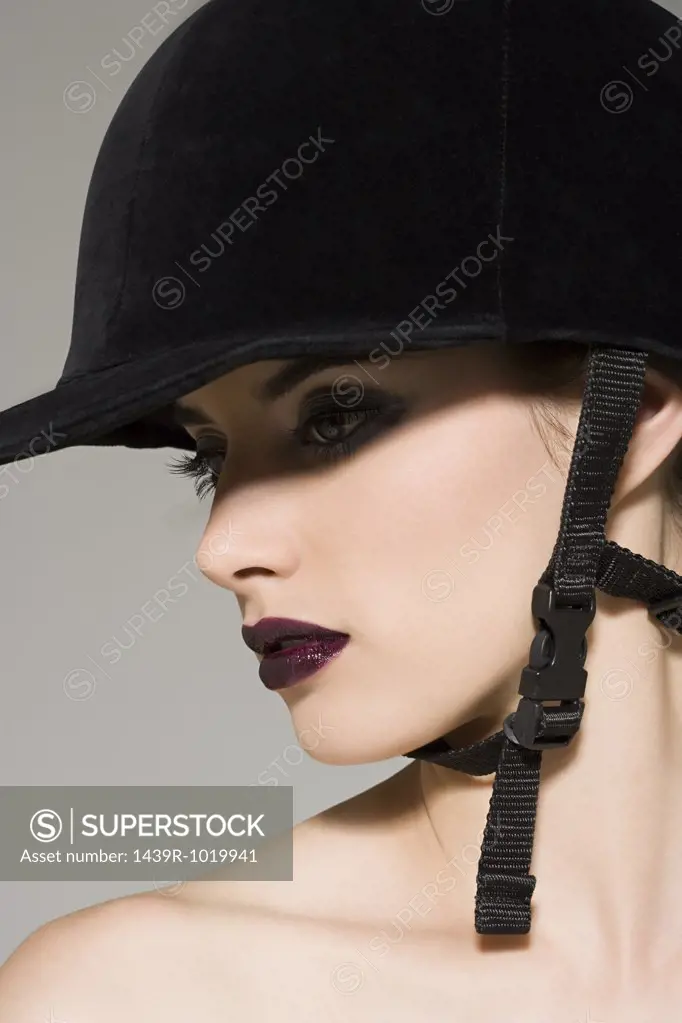 Woman in a riding hat