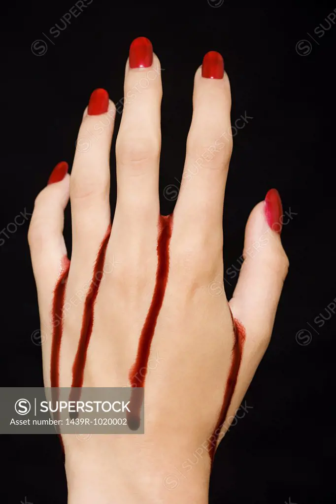 Female hand with blood