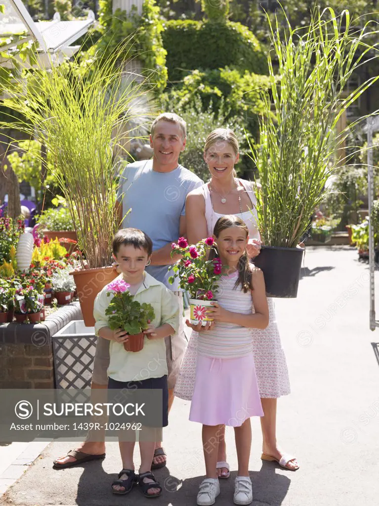 Family in a garden centre