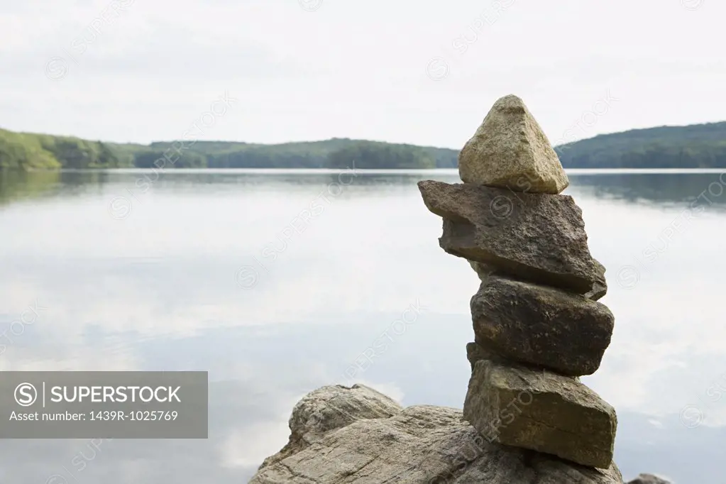Pile of rocks by a lake