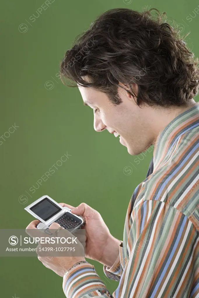 Man with handheld computer
