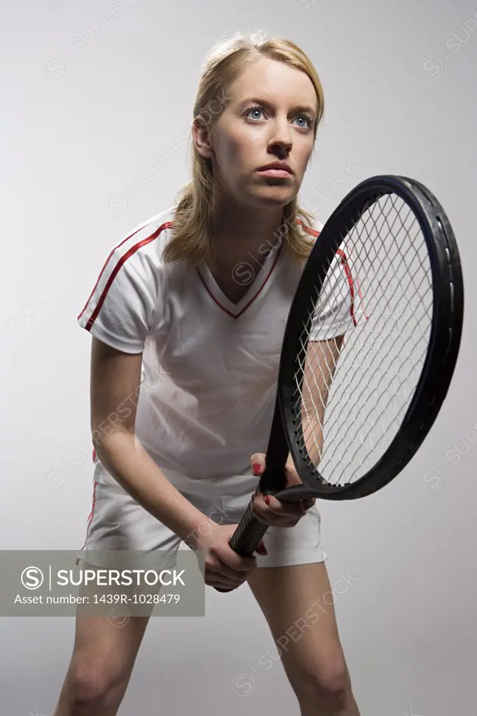 Tennis player holding tennis racket