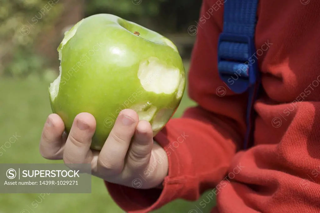 Child with an apple