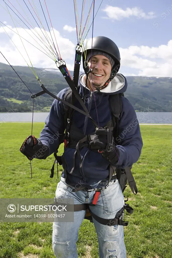Smiling male parachutist