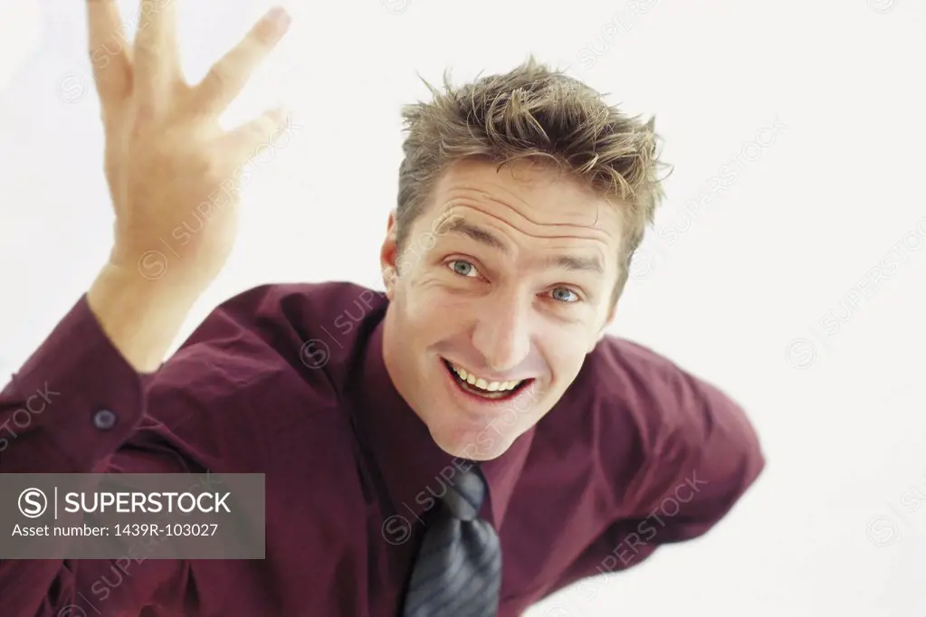 Portrait of businessman gesturing