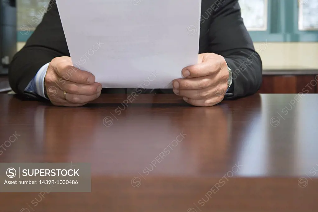 Man reading a resume