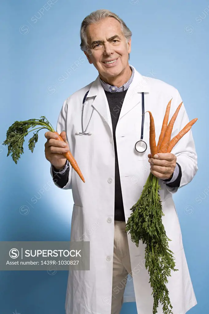 Doctor holding carrots