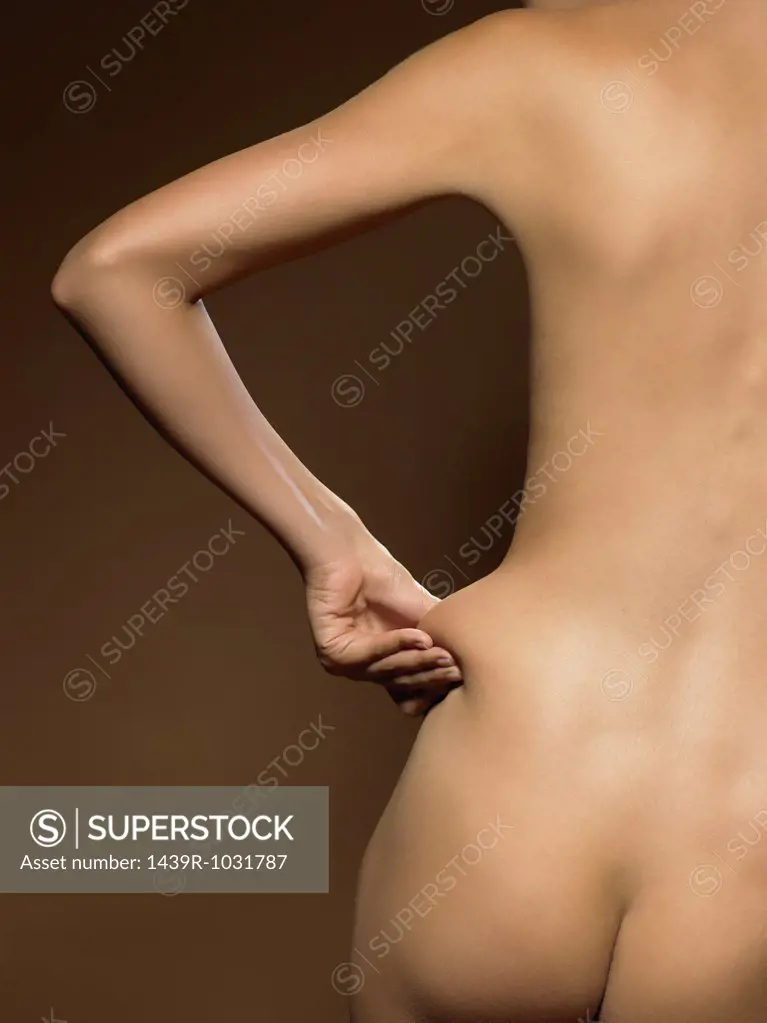 Woman pinching skin