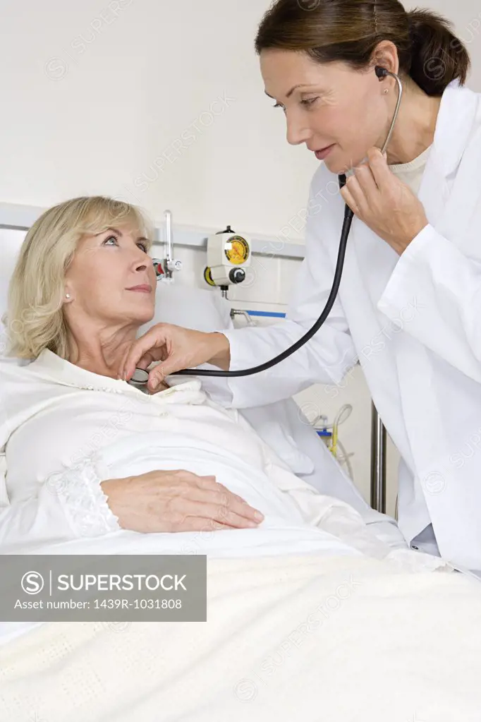 Patient and doctor with stethoscope