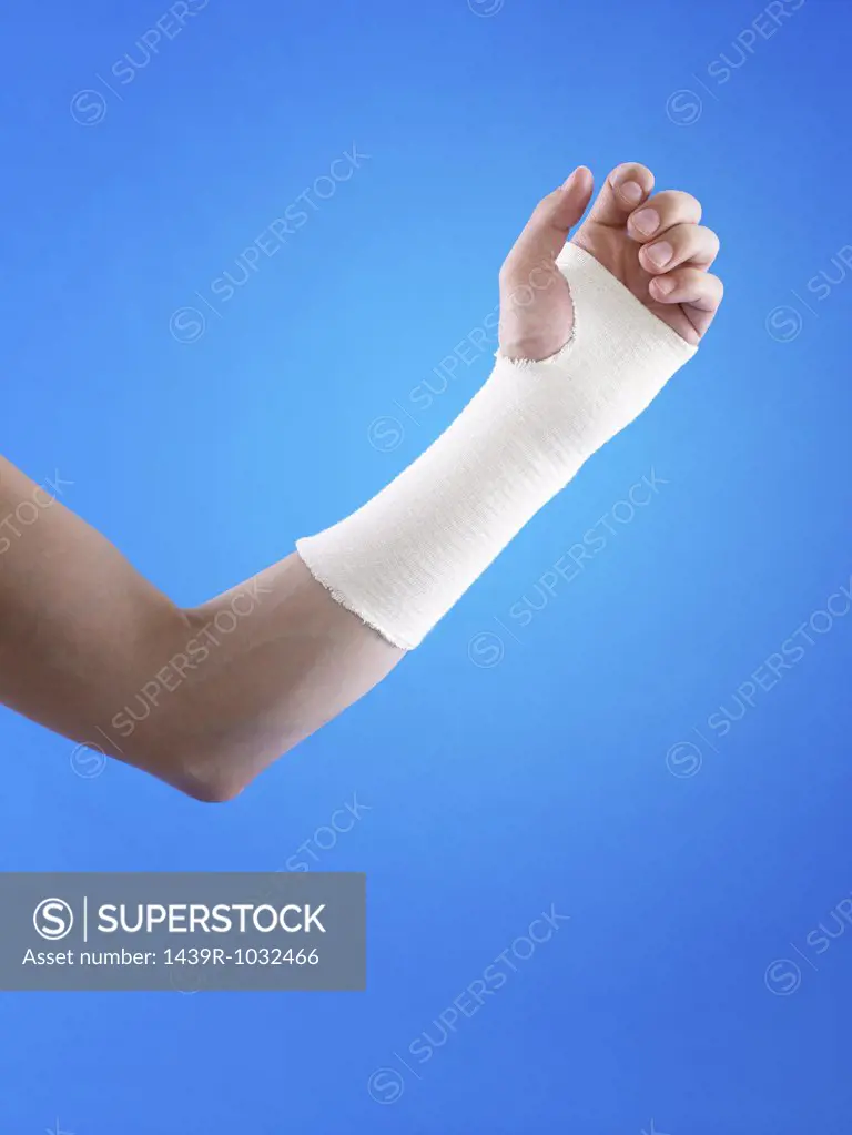 Man with bandage on wrist