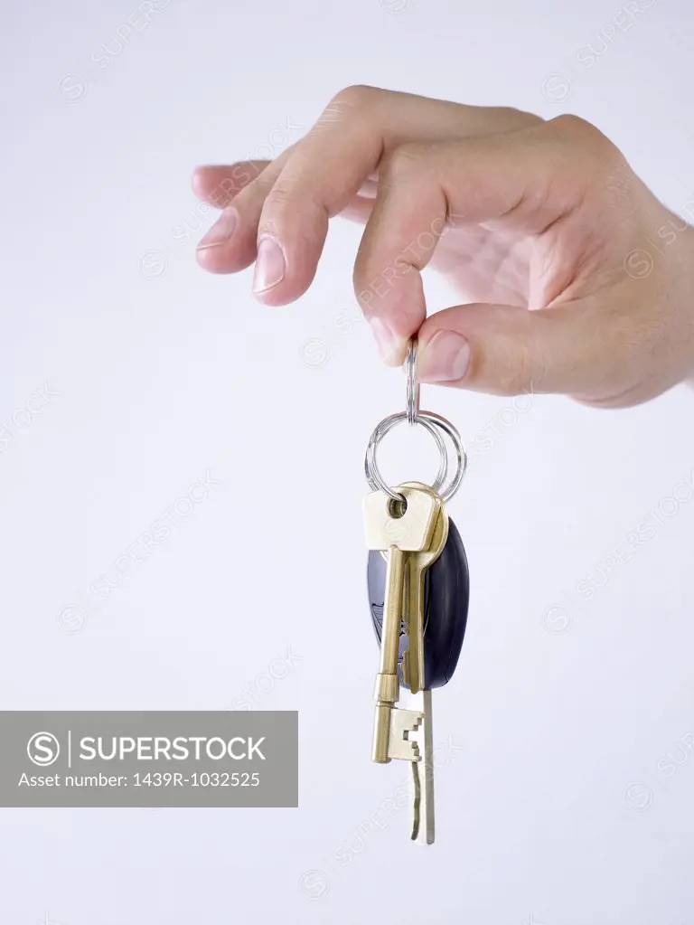 Person holding keys