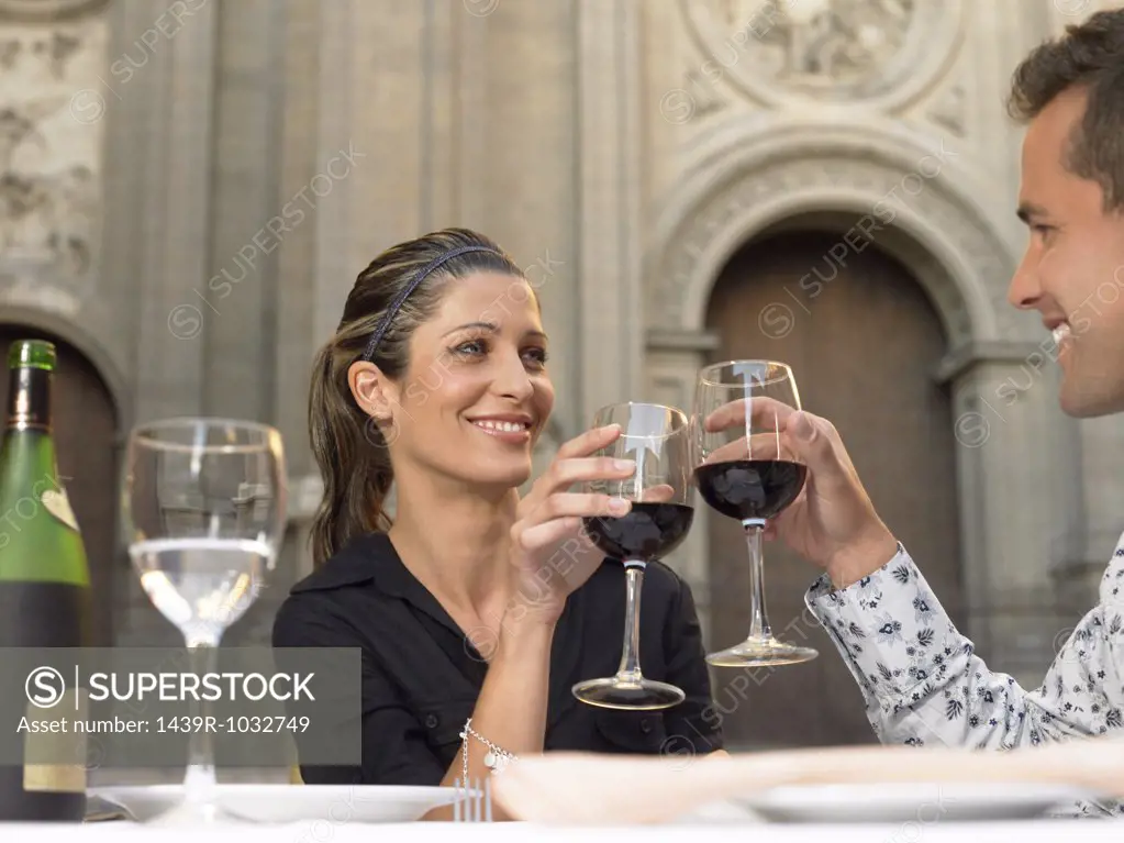 Couple toasting with wine