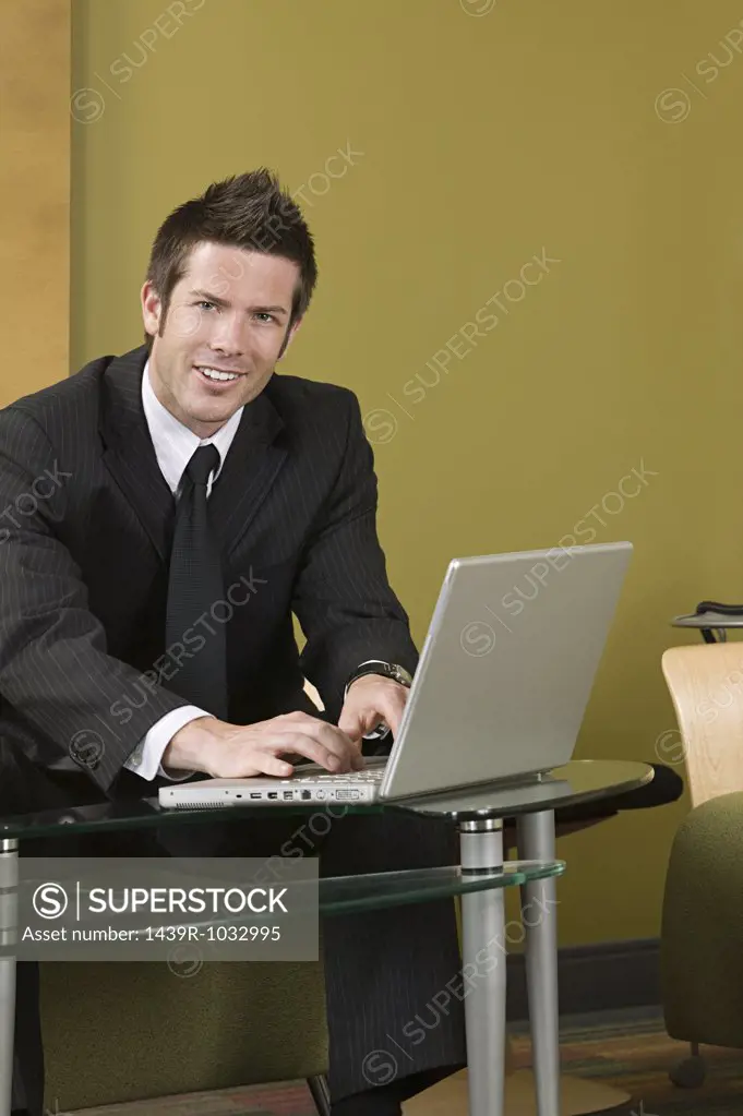 Businessman using laptop 
