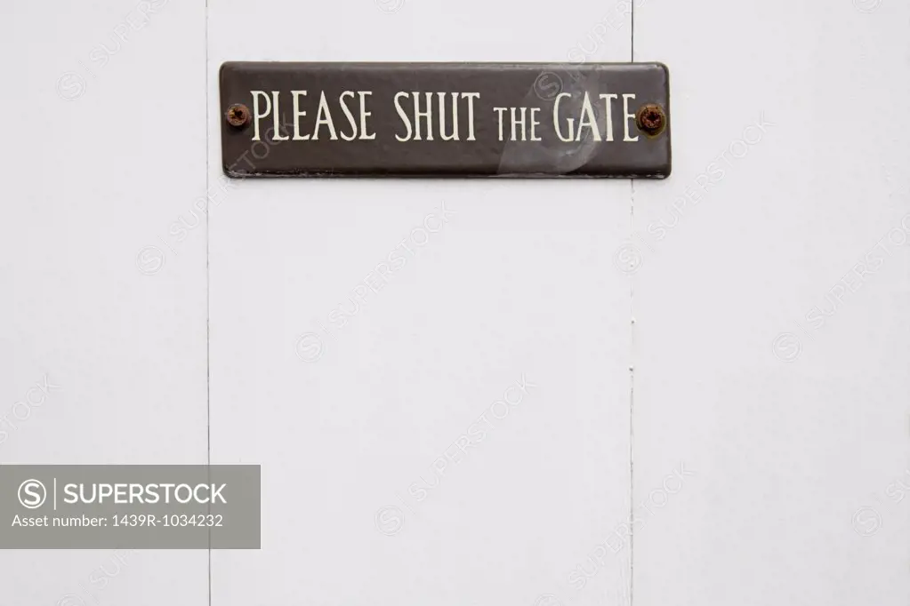Sign on a gate