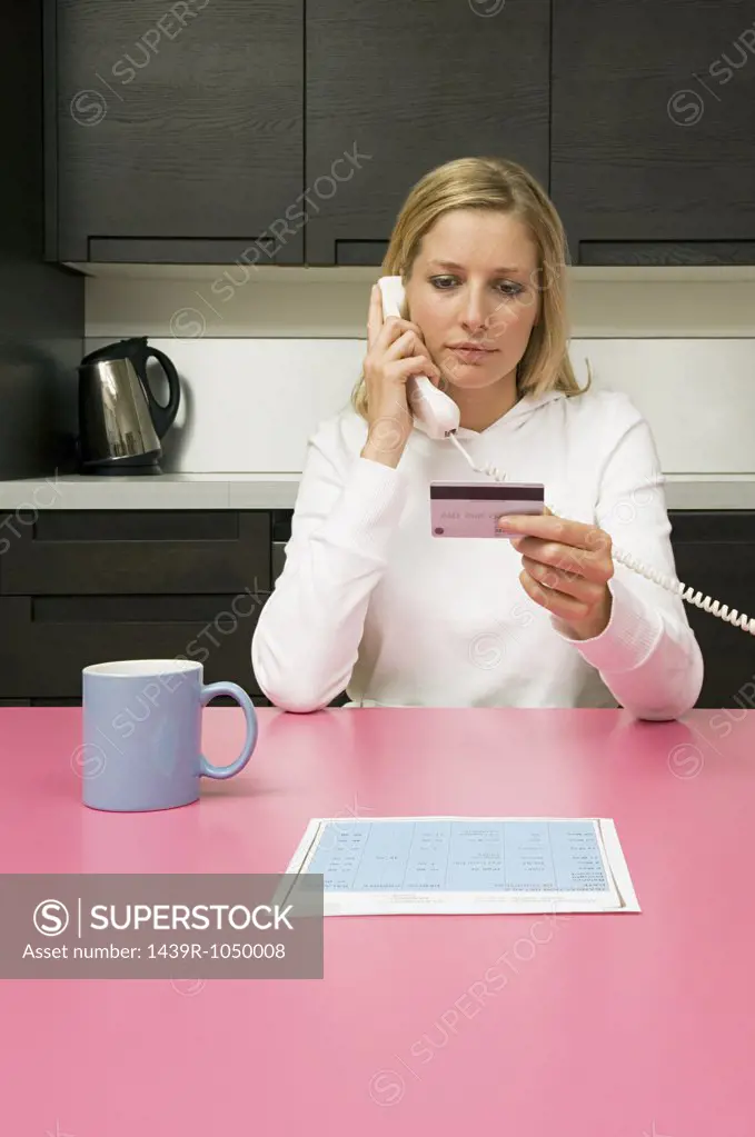 Woman telephone banking