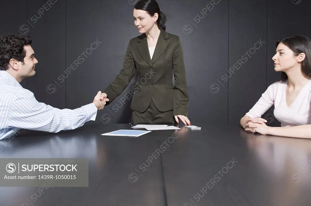 Man shaking hands with divorce lawyer