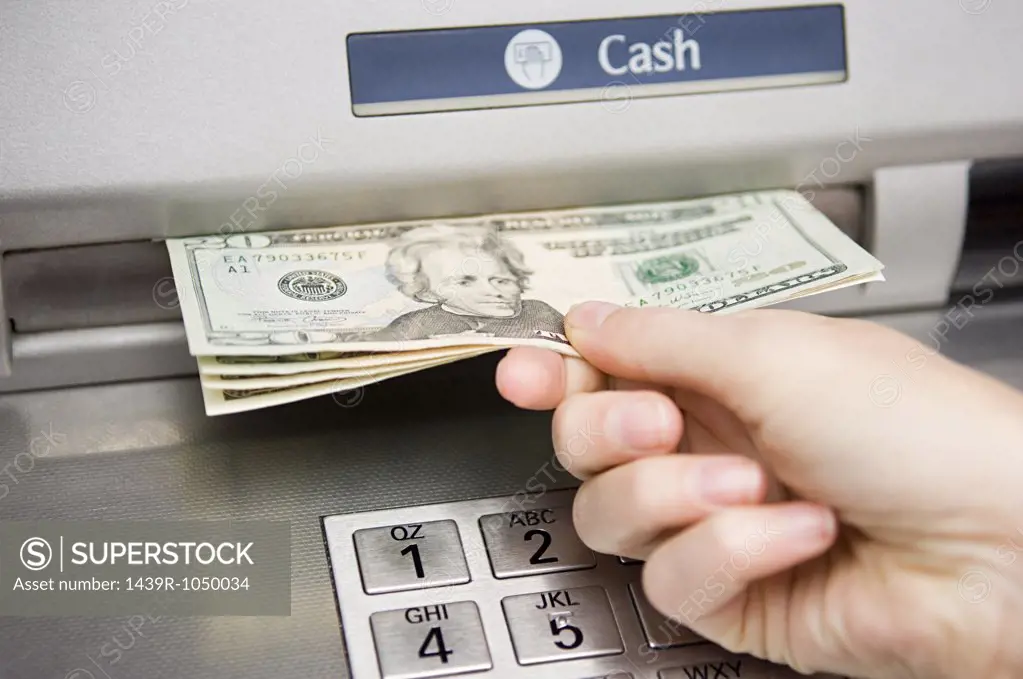 Person withdrawing cash
