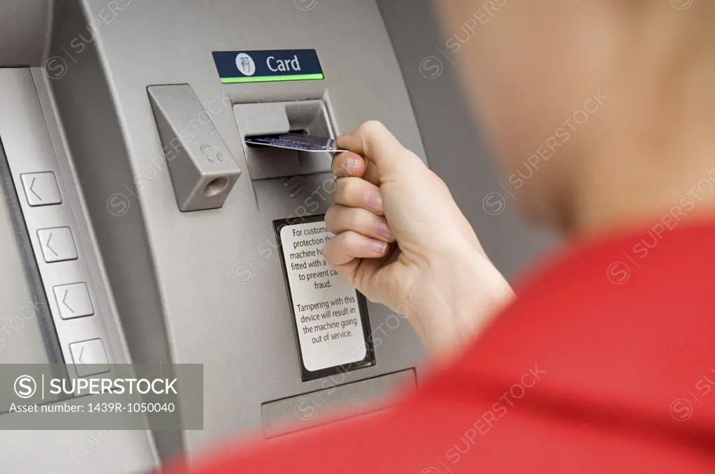 Person using cash machine