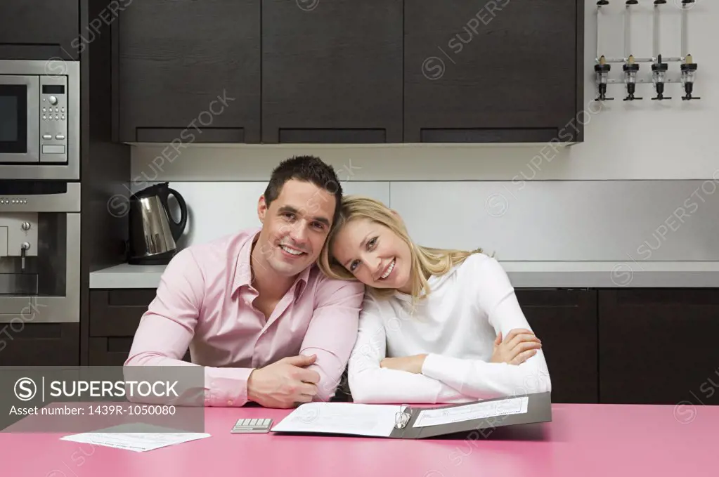Couple with bank statements