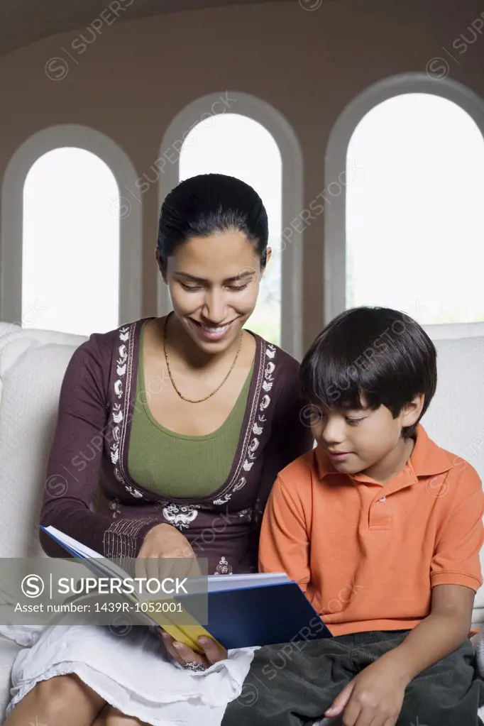Woman and boy reading