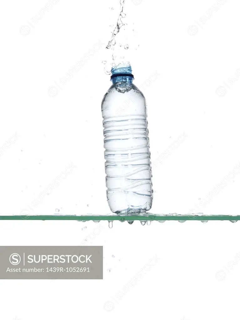 Bottle of water being dropped
