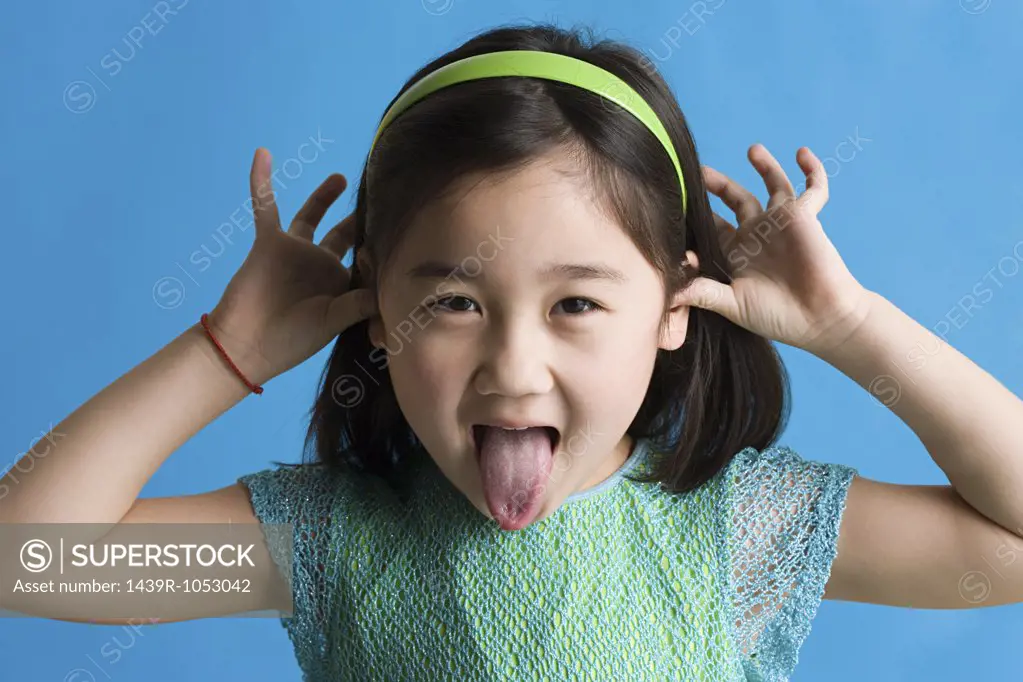 Girl making faces