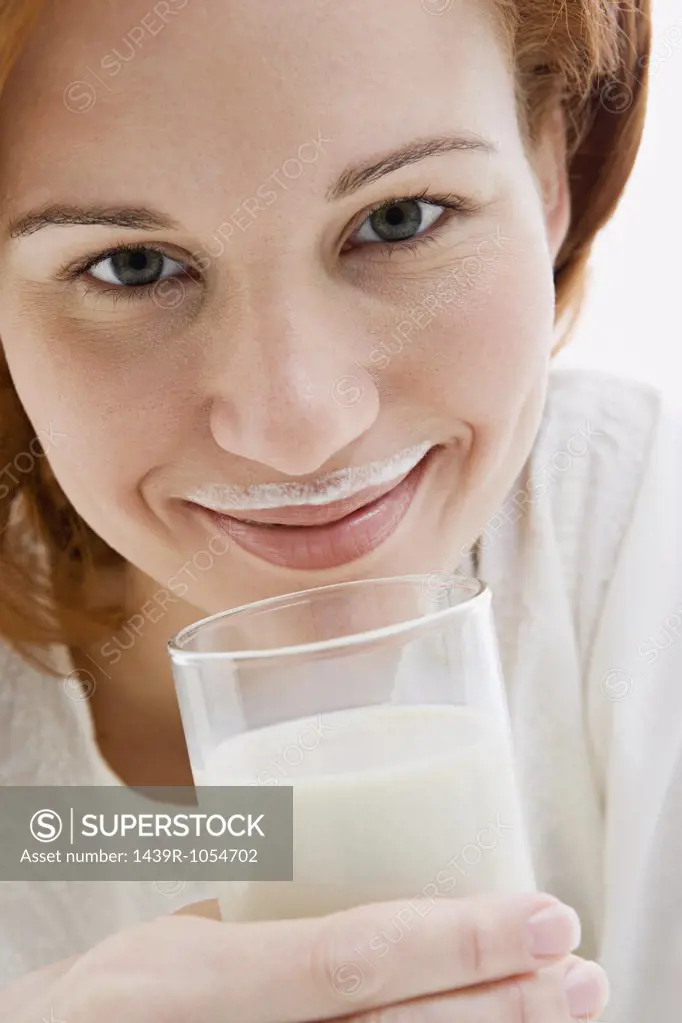 Woman with a milk moustache