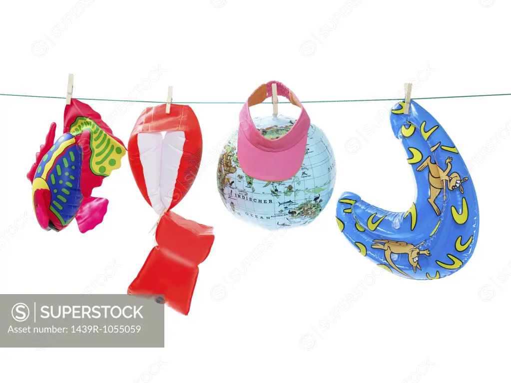 Inflatable toys on washing line