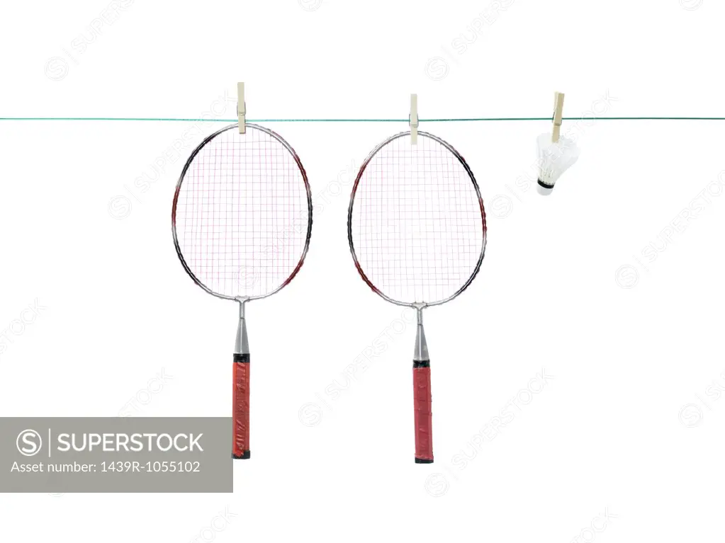 Badminton racket and shuttlecock on a washing line