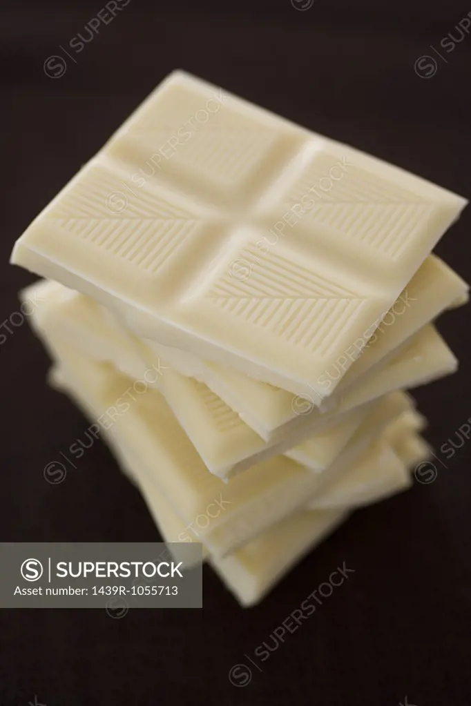 White chocolate bars in a pile