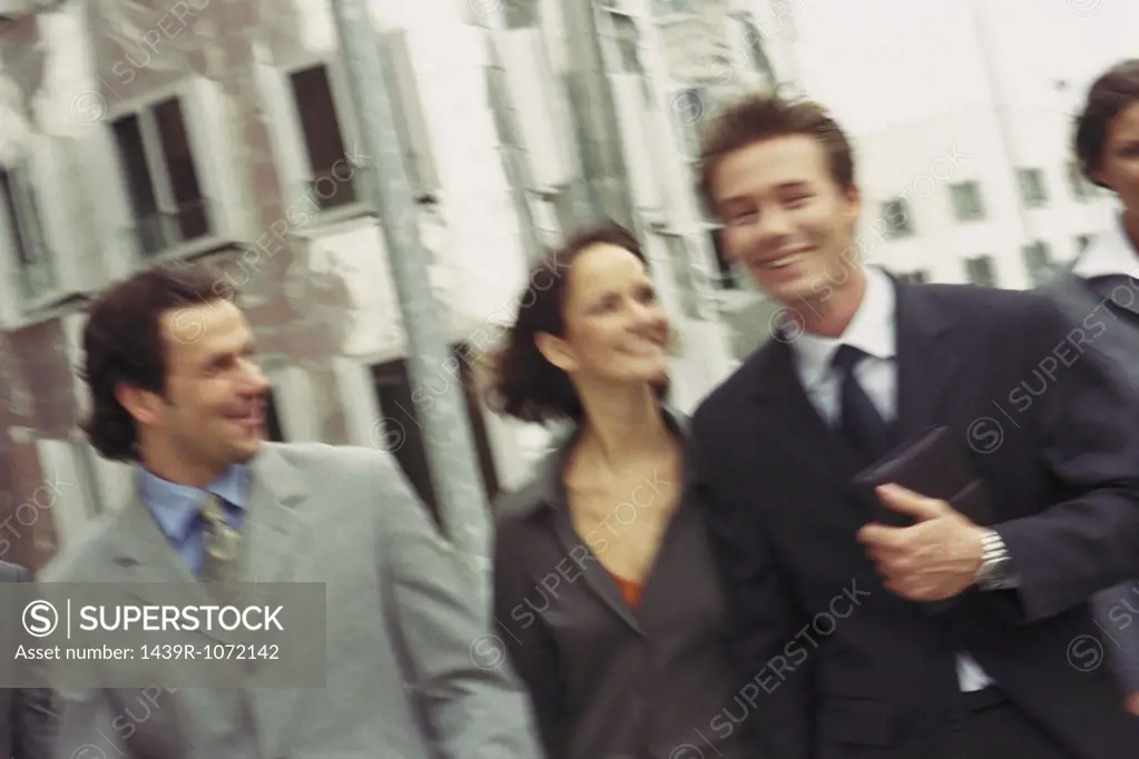 Blurred businesspeople