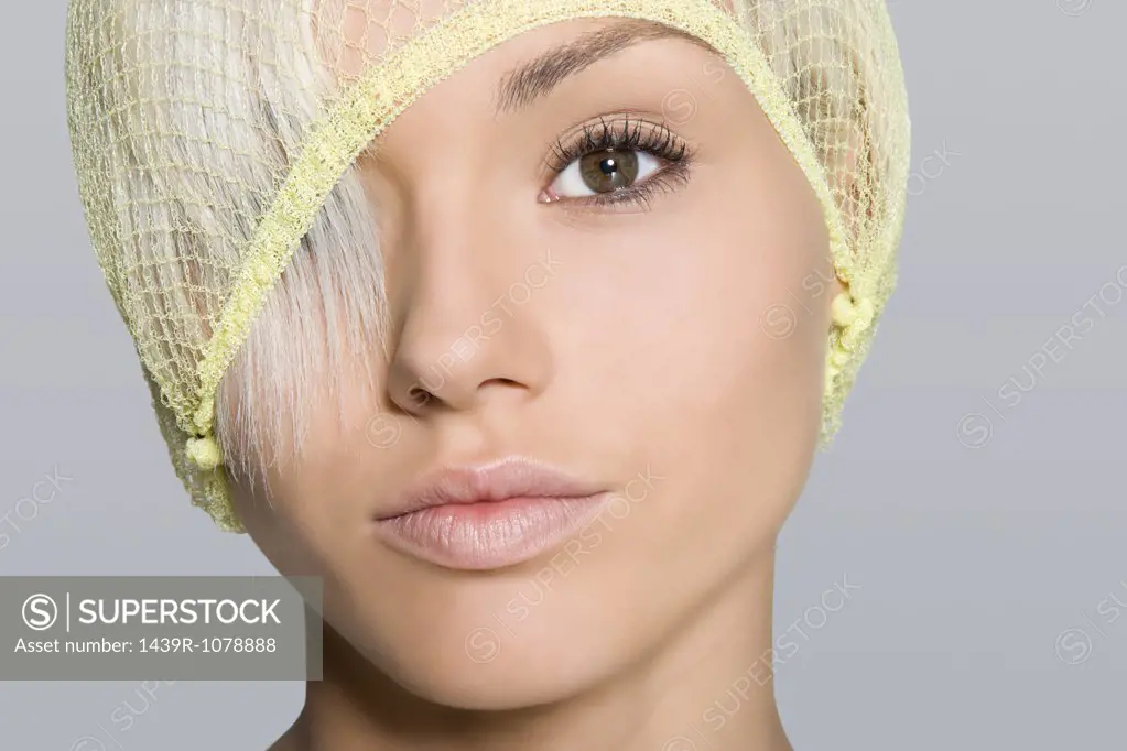 Portrait of a woman wearing a hairnet