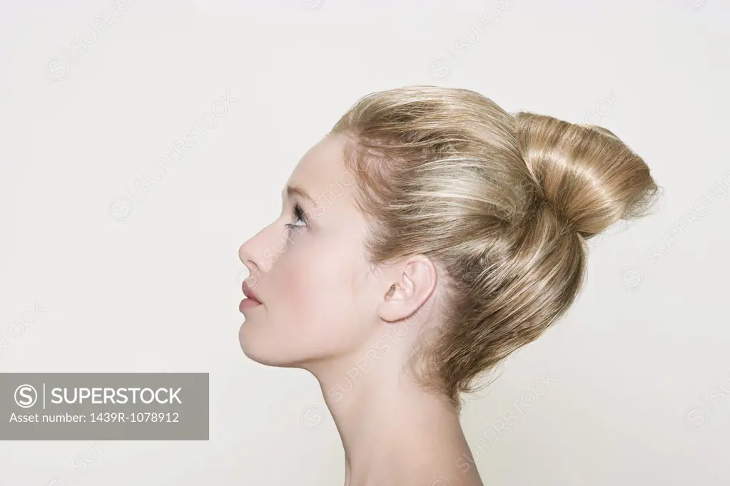 Profile of a woman with a hairstyle